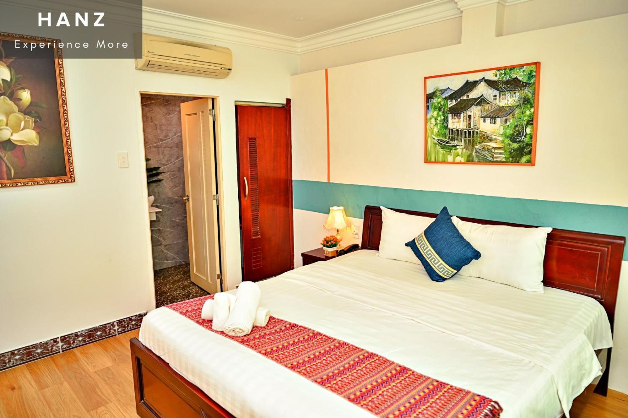 Cosmo Central Hotel Hô Chi Minh-Ville Chambre photo