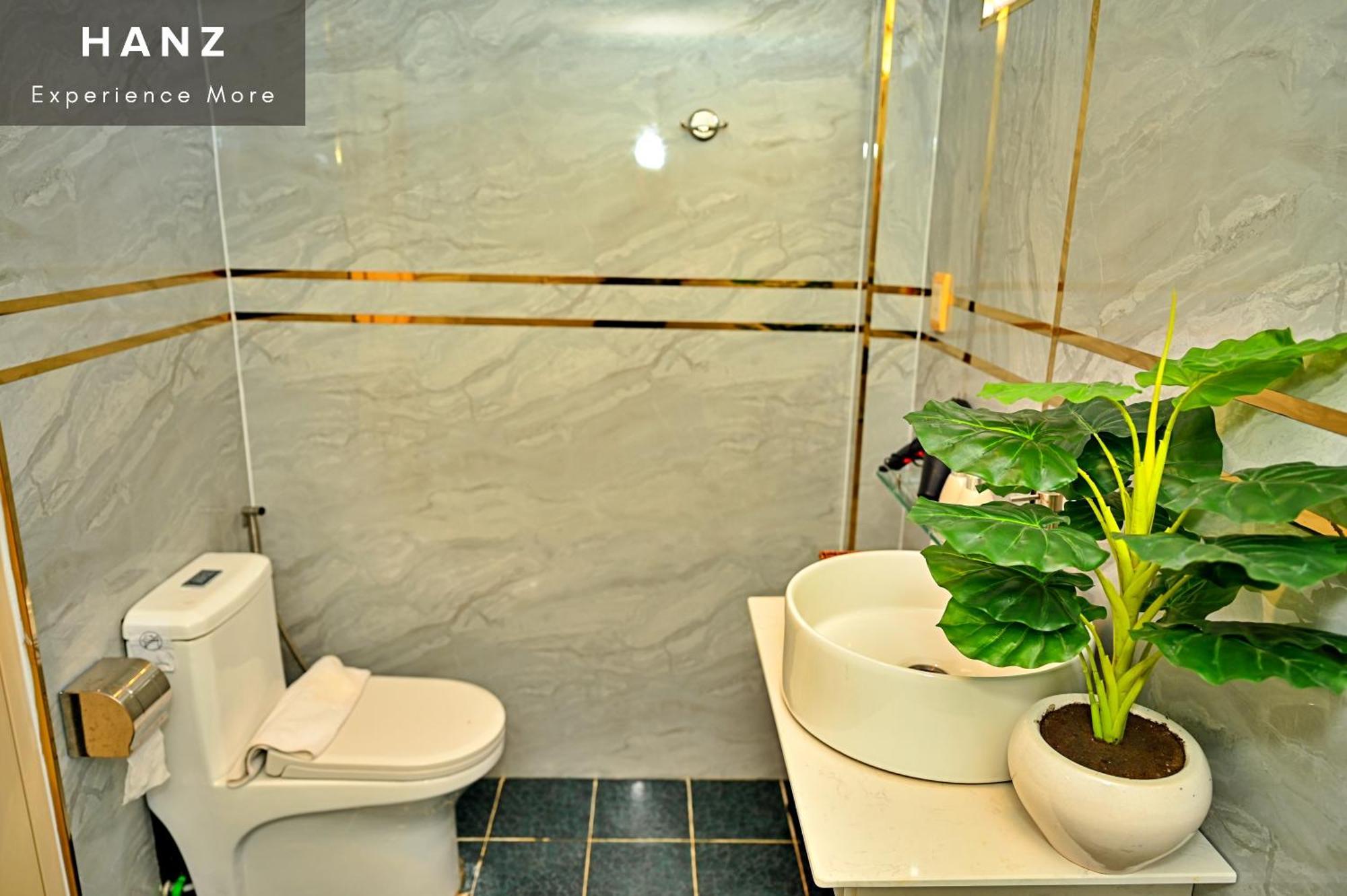 Cosmo Central Hotel Hô Chi Minh-Ville Chambre photo