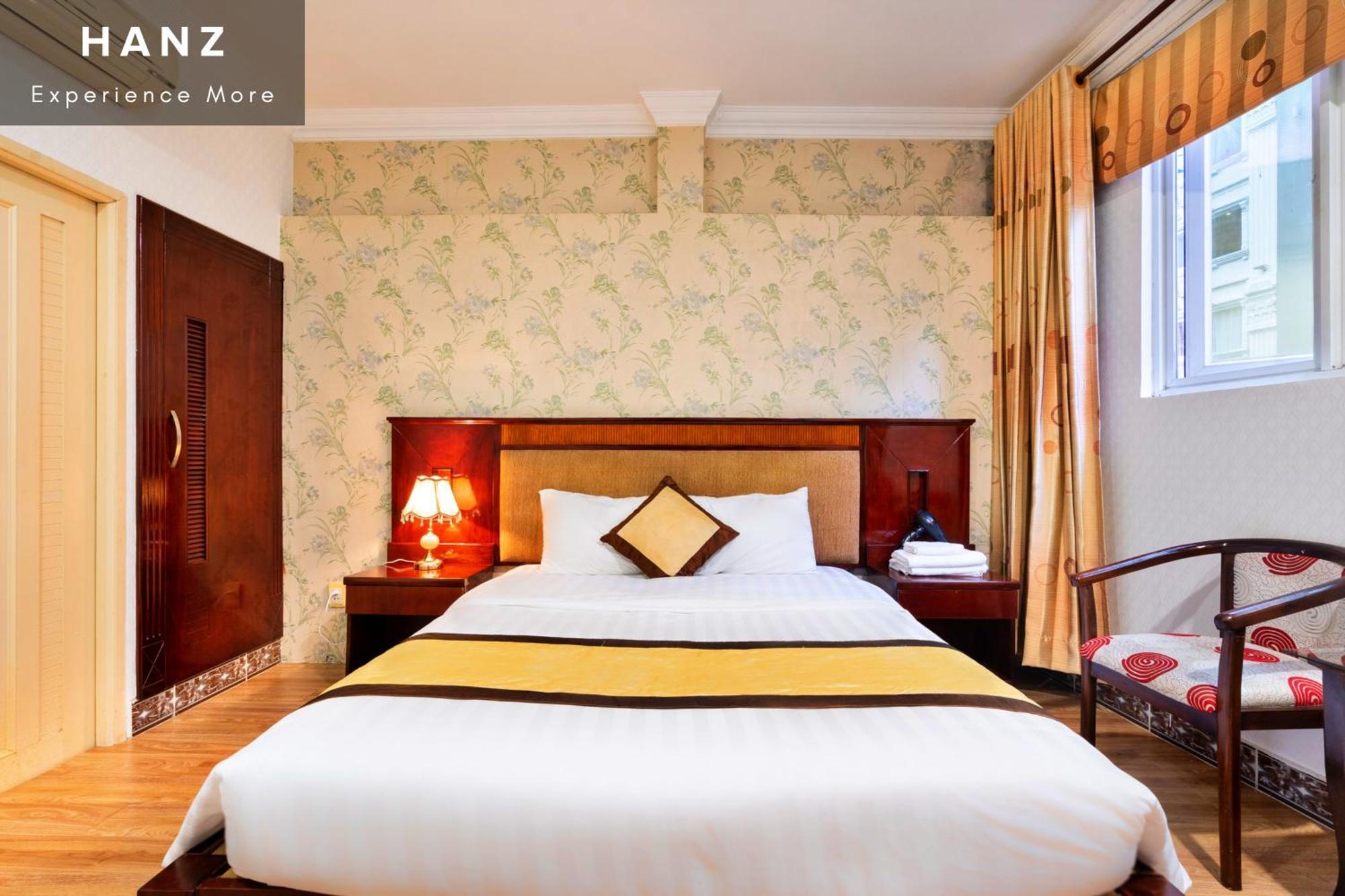 Cosmo Central Hotel Hô Chi Minh-Ville Chambre photo